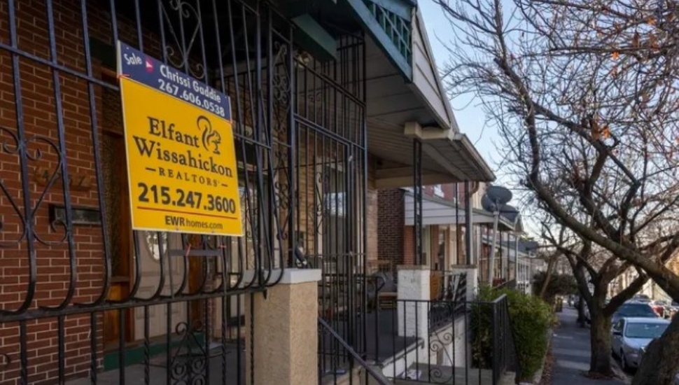 A sign advertising a home for sale at 425 Penn Street in Philadelphia.