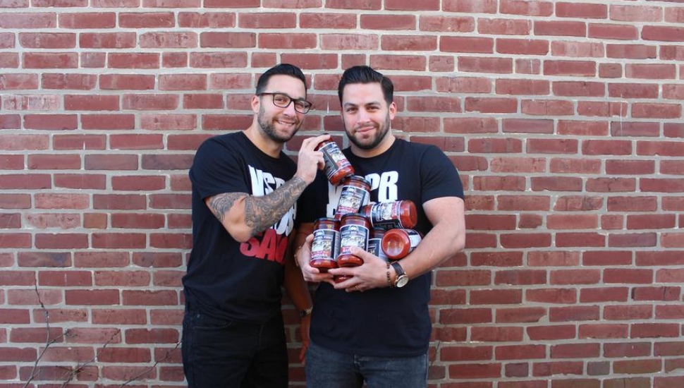 Bill and John Vesper with some of the Vesper Bros. Foods sauces.