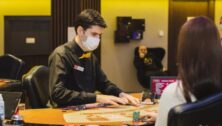 Player at a casino gaming table.