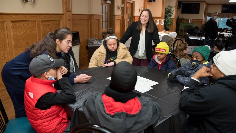 Gina McLaughlin with students from Drexel Neumann Academy in Chester.