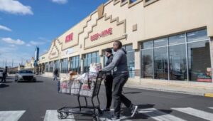 Customers leave the Acme Market in the Bala Cynwyd Shopping Center