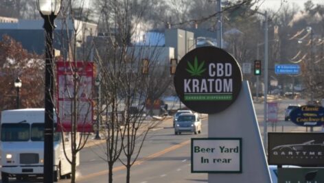 The CBD Kratom sign outside the store along Lancaster Avenue.