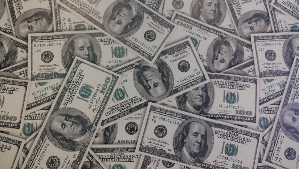 A pile of U.S. currency.