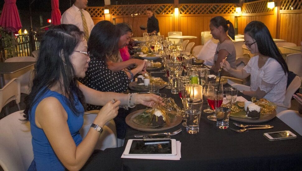 Enjoying a rooftop dining moment at Azie in Media.