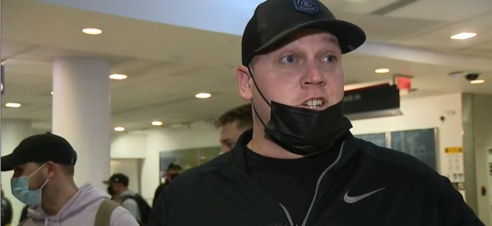 A Philadelphia International Airport passenger talking about wearing masks.