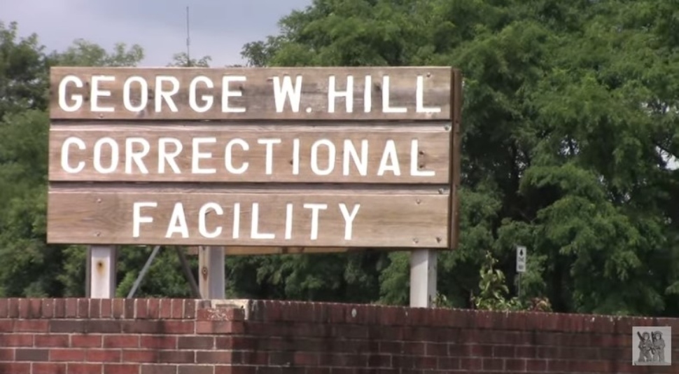 Sign for George W. Hill Correctional Facility, now under Delaware County management, which is working to reduce the prison population.