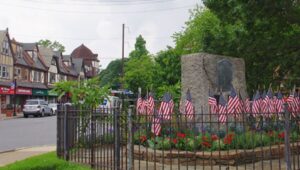 A memorial with American flags in downtown Swarthmore Borough.