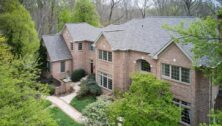 Overview of the brick colonial at 2 Windbrook Drive in Springfield.