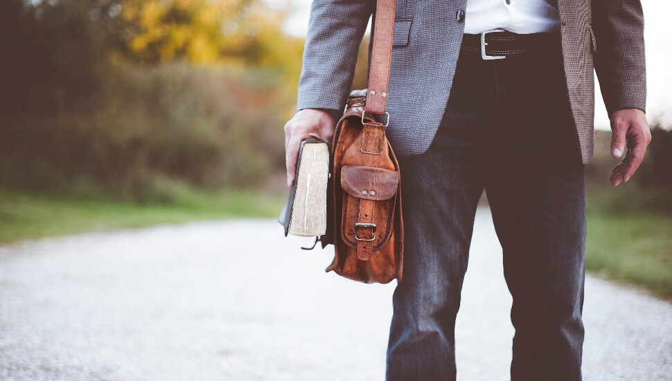 Man in jeans on his way to the office
