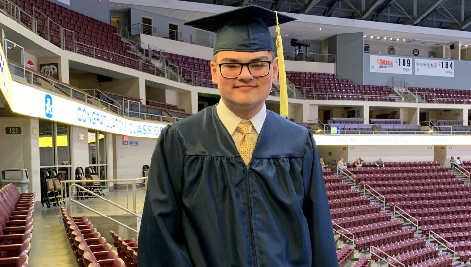 Vincent Varallo dressed for graduation.