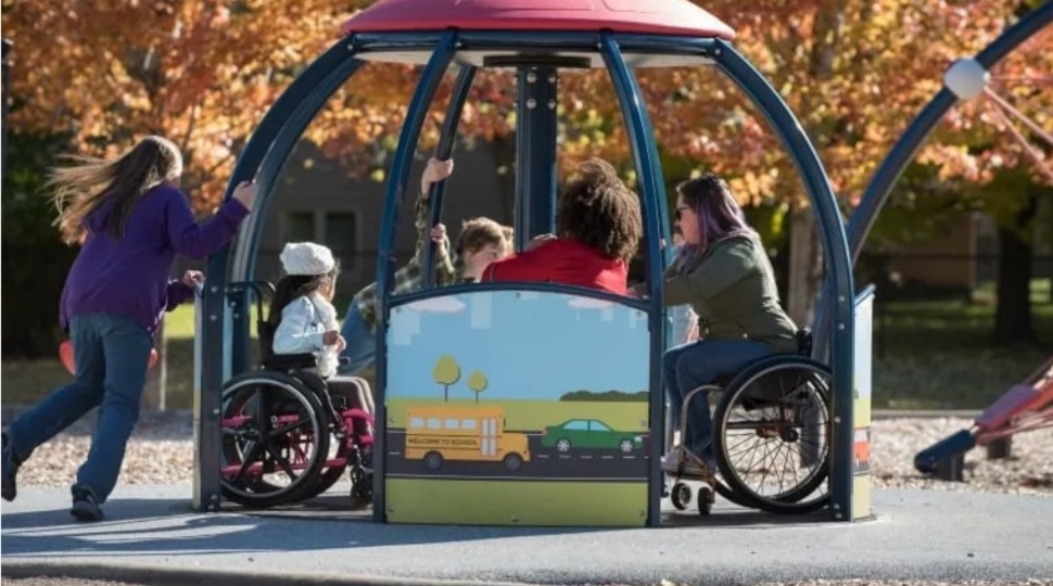 The We-Go-Round by Landscape Structures, an example of inclusive play.