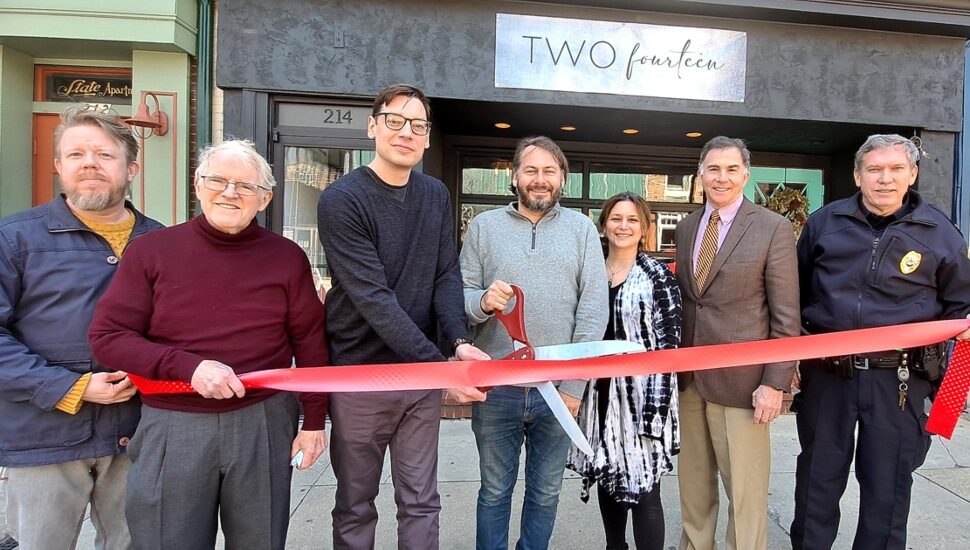 A ribbon cutting for the new Two Fourteen restaurant in Media.