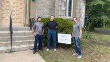 Brad Brown, Corey Brown and Illya Zayarchenko outside Hope Community Church in Ridley Park.