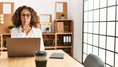 Woman quiet quitting in her office