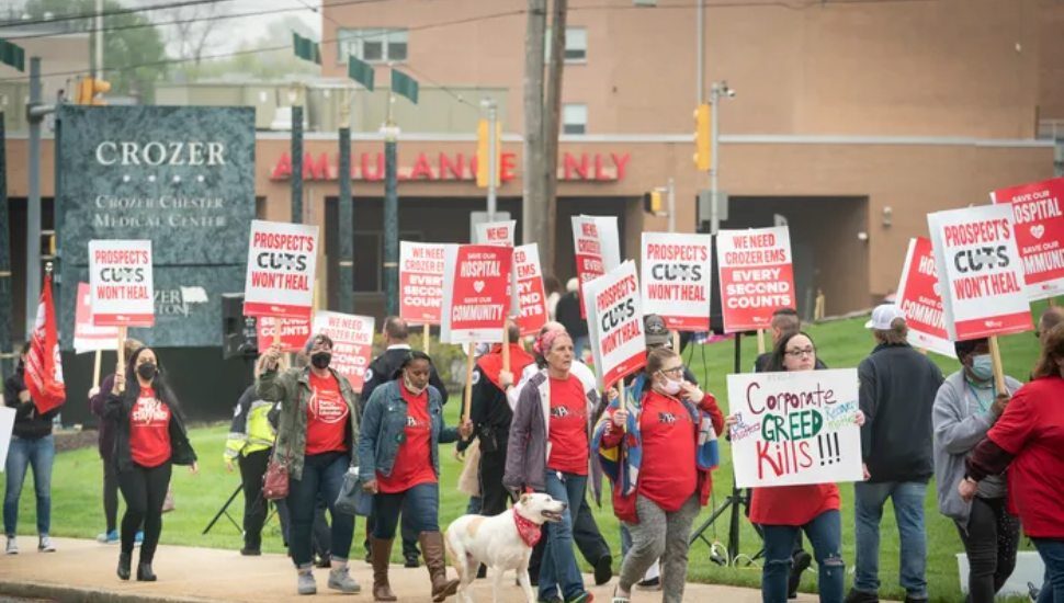 Health care workers protest outside a hospital in Upland, PA.