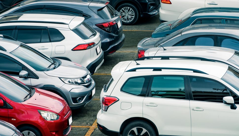 A parking lot filled with cars