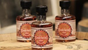 Bottles of Bloody Butcher Sour Mash Straight Bourbon Whiskey on a table