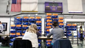 Election workers check ballots before sending them to be counted in Pennsylvania in November 2020