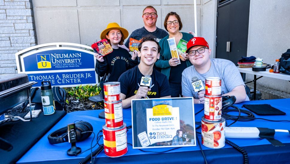 Anchoring and organizing a Neumann College Radio Day event to benefit a food pantry are Nick Coppola, Alex Castells (front) and Sarah Taddei, Sean McDonald and Rina Keller.