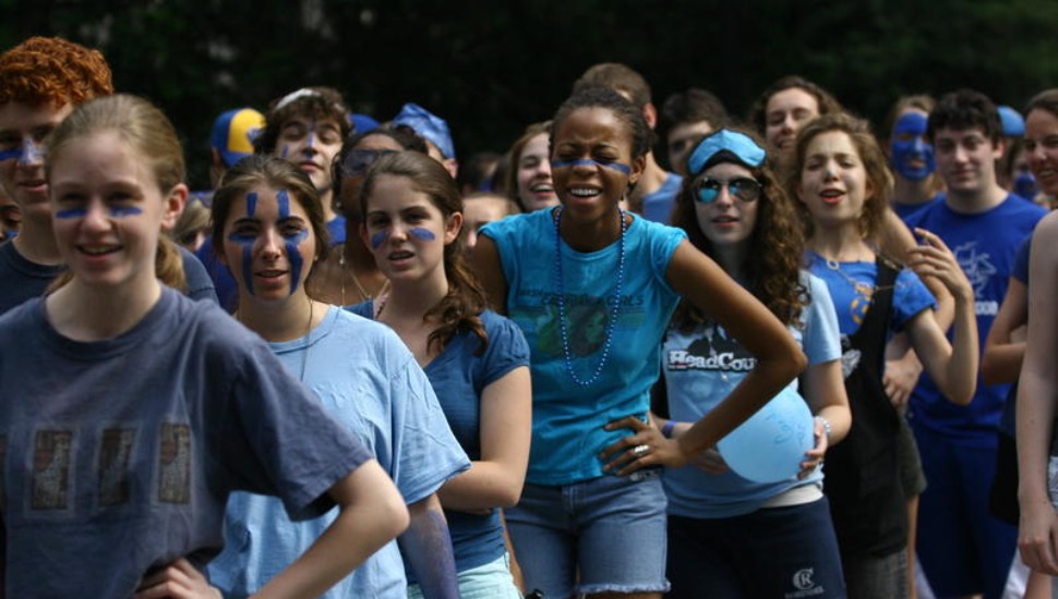 Several college students standing in a line