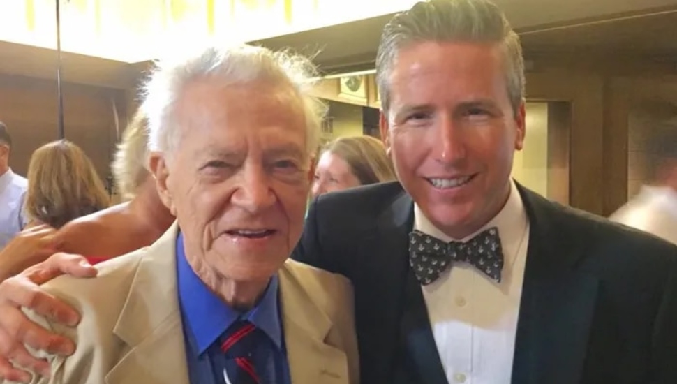 McCloskey standing with nephew