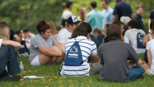 Students sitting on the ground at Penn State Brandywine in Media