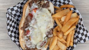 Overhead view of an open-faced Philly cheesesteak