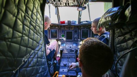 Cadets check out the interior of a helicopter
