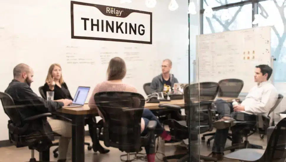 People meeting at Relay Network office in 2019 founded by Matt Gillin