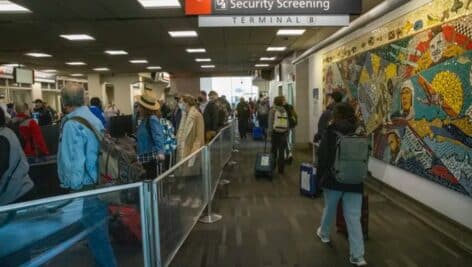 Holiday travelers near the TSA entrance at Terminal B, Philadelphia International Airport on the day before Thanksgiving, November 24, 2021.