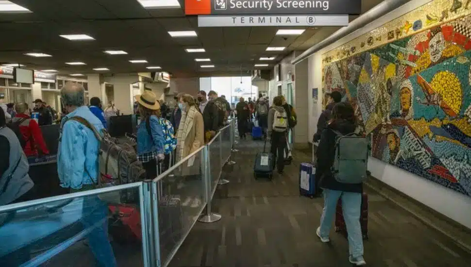 Holiday travelers near the TSA entrance at Terminal B, Philadelphia International Airport on the day before Thanksgiving, November 24, 2021.