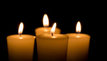 Three lit candles