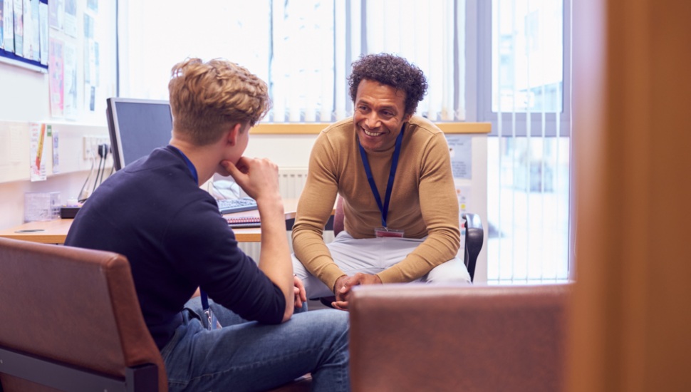 A counselor talks with a client