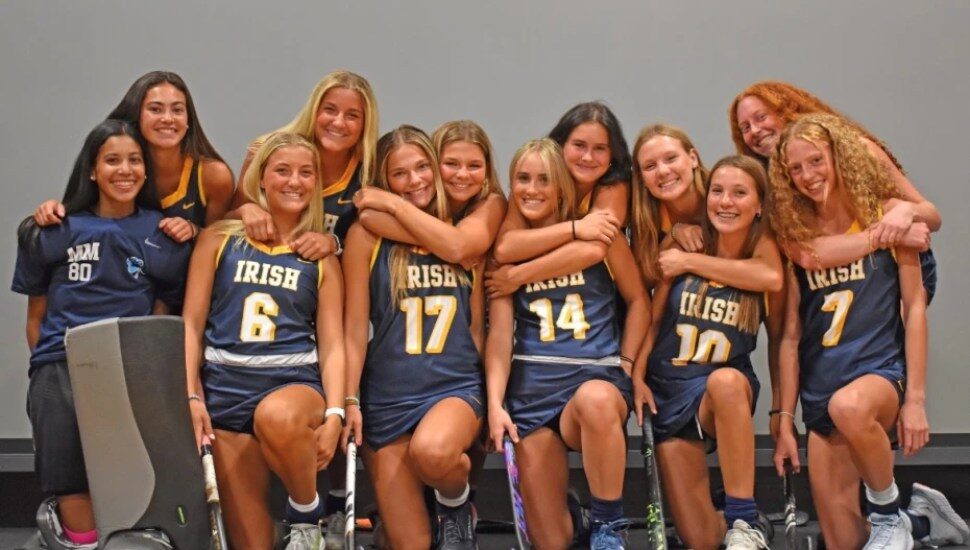 Notre Dame’s varsity field hockey team has six sets of sisters, shown here.