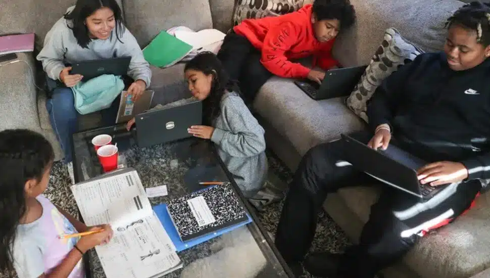 The children in the Roberts family do their homework in Yeadon