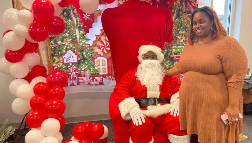 Cliton Heights business owner Jazzmine Saunders helped coordinate Clifton Height's first Frost Fest. She is seen here with Santa, aka her husband, Omar