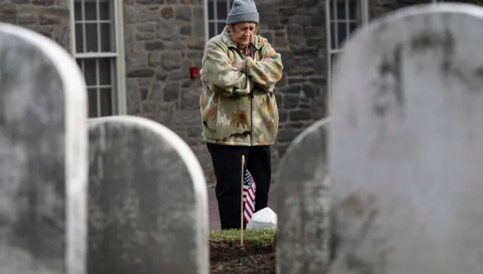 Rita O’Vary visits the gravesite of Joseph Zarelli at Ivy Hill Cemetery in Philadelphia
