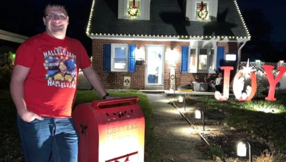 Nick Spica of Secane at the mailbox out front of his home