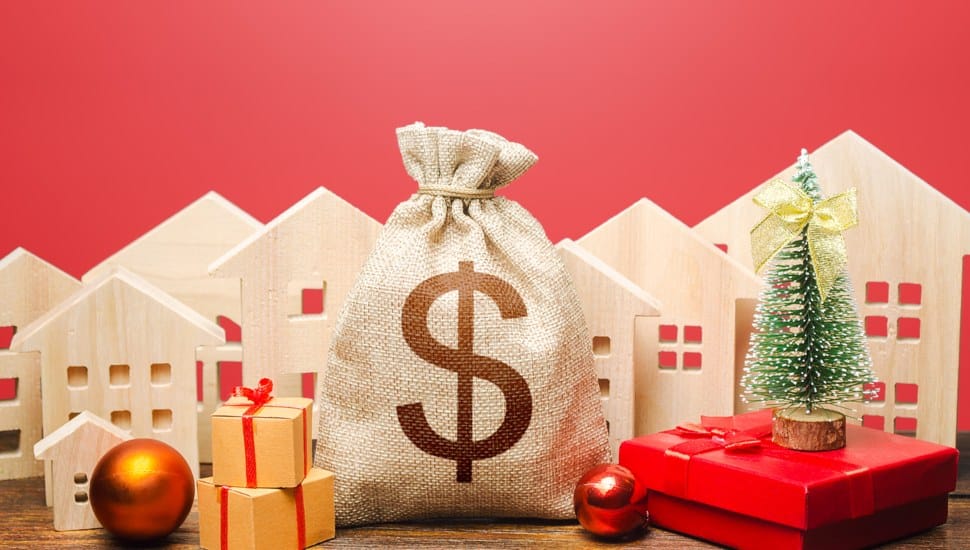 Moneybags, cut out houses and Christmas decorations signifying it's time to adopt the 2023 proposed budget for Delaware County