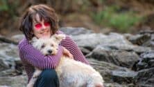 Photographer Carol Arscott with a dog