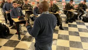 Valley Forge Military Academy cadets receive instruction in class