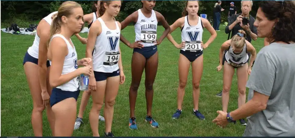 Gina Procaccio talks with her Villanova team