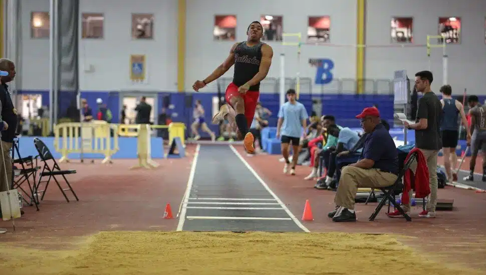 Jordyn Walker in mid-air during a jump.