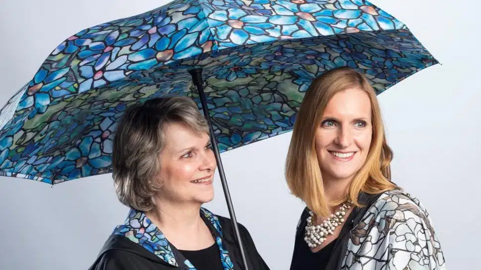 Jan Hartman (left) and Lindsay Hagerman in their signature cape
