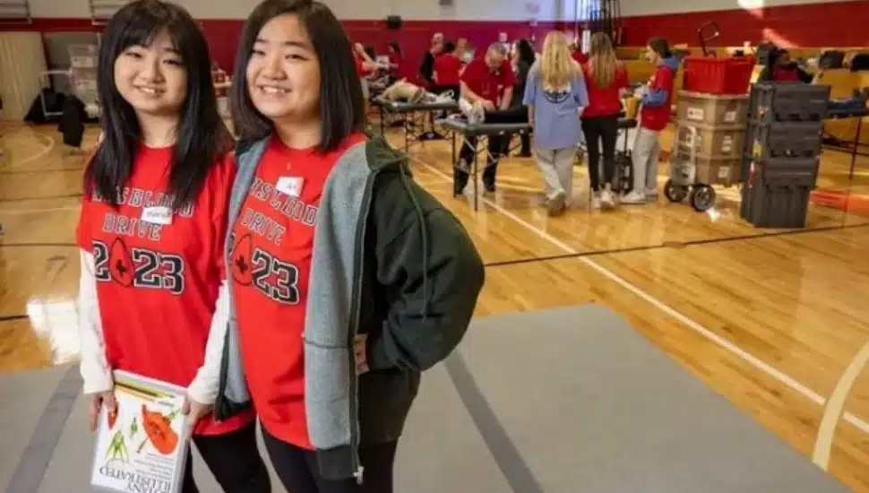 Twin sisters Michele (left) and Jess Sun