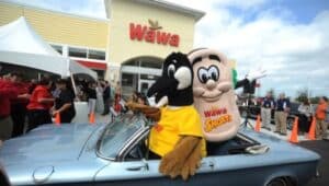 Wawa's Wally Goose, in the driver's seat and Shorti, in the rear during the opening of a Wawa store,