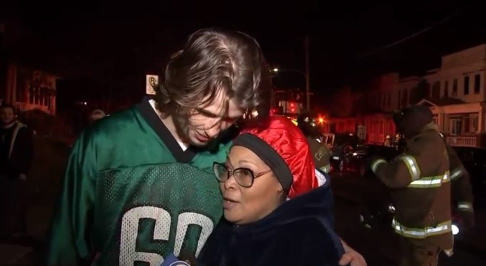 College student Jarrett Niland and Chester resident Charmaine Burrell after a fire on her street