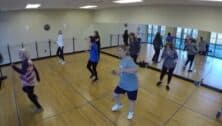 Older woman are doing some dance moves at a fitness class in Havertown called "Dancing Divas."