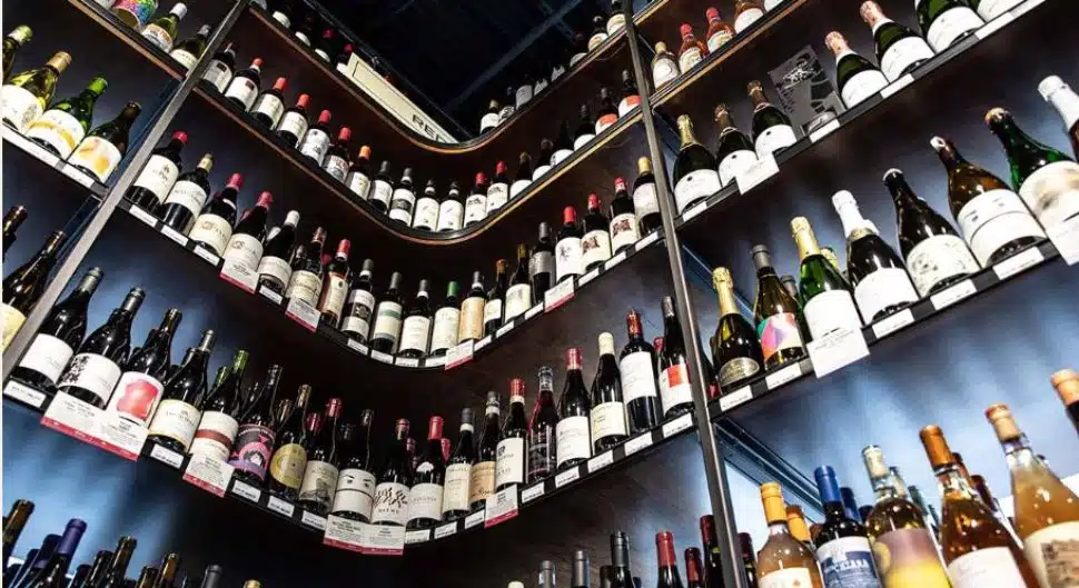 Wine bottles on the shelf at Di Bruno Bros. in Wayne
