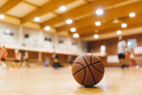 Basketball on wooden floor court